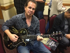 Doug Perkins with Howard Roberts' Black Guitar